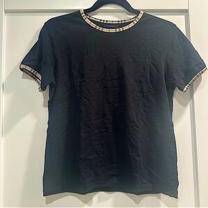 Burberry scoop neck t shirt , plaid detail on collar and sleeve . Size large .